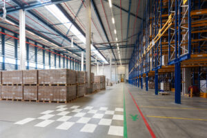 view of full warehouse with forklift