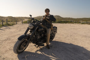 full shot man riding motorbike (1)