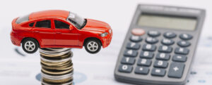 toy car coin stack with calculator report